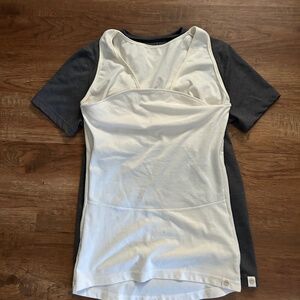 Two Lalabu baby wearing shirts